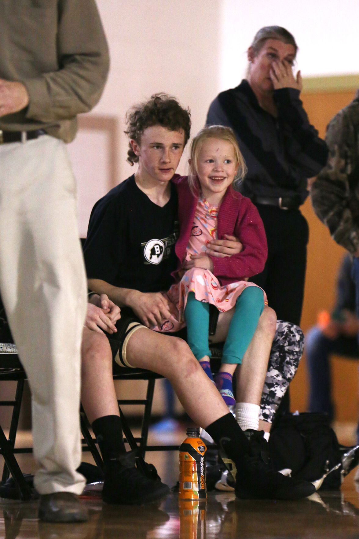 Brenton Ross holds sister Shae Boller